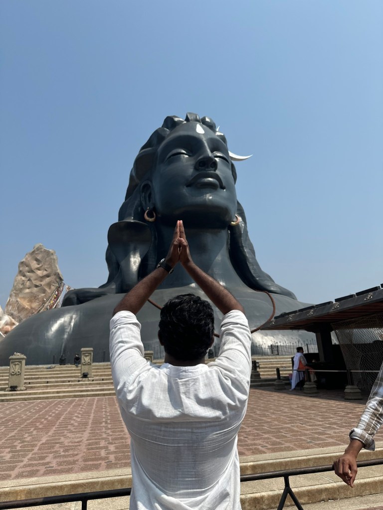 Thana facing the Adiyogi statue at Isha Foundation, Coimbatore