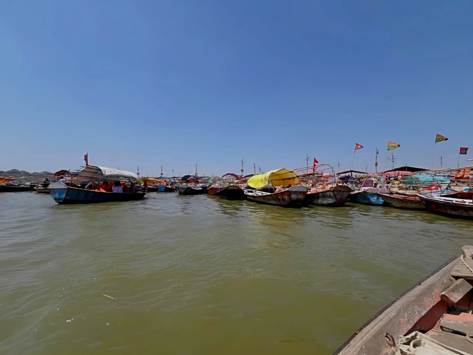 Colourful boats gathered on the river at Prayagraj