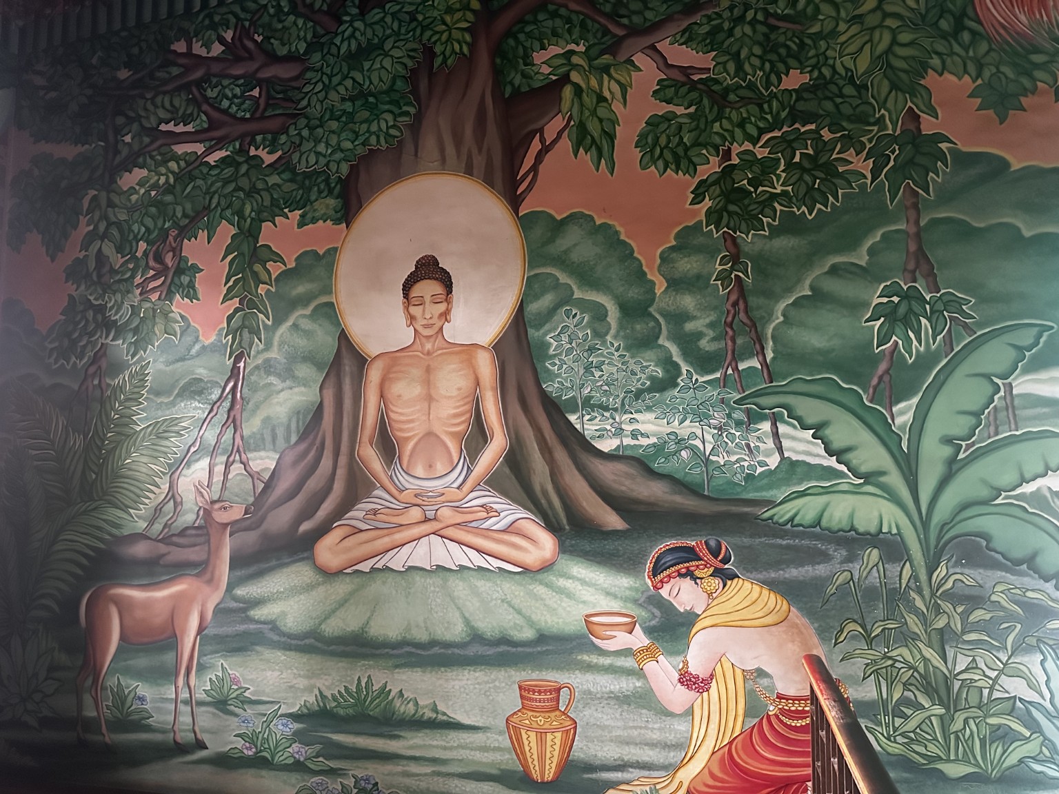 Mural depicting the Buddha beneath a tree