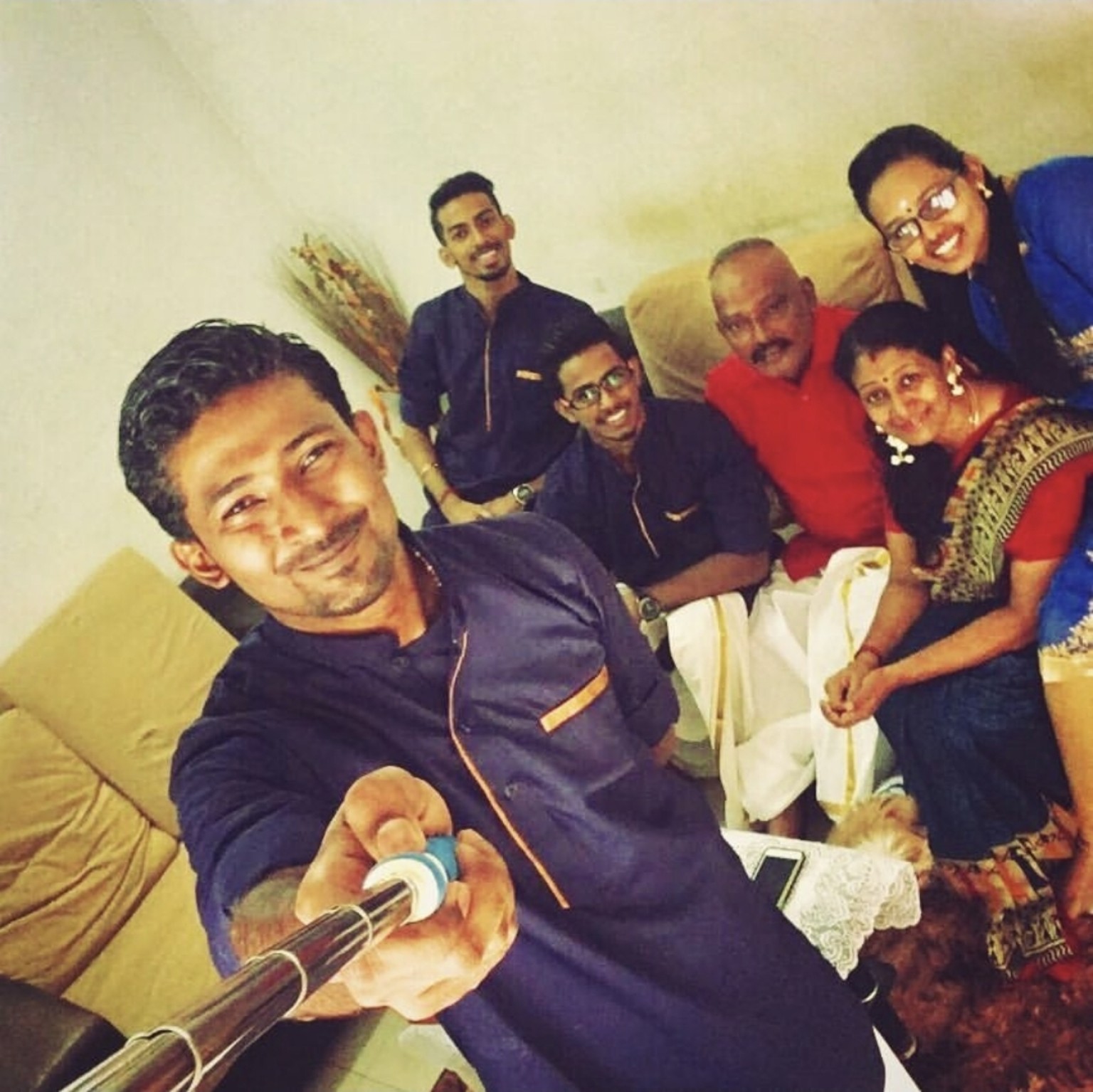 Thana taking a family selfie