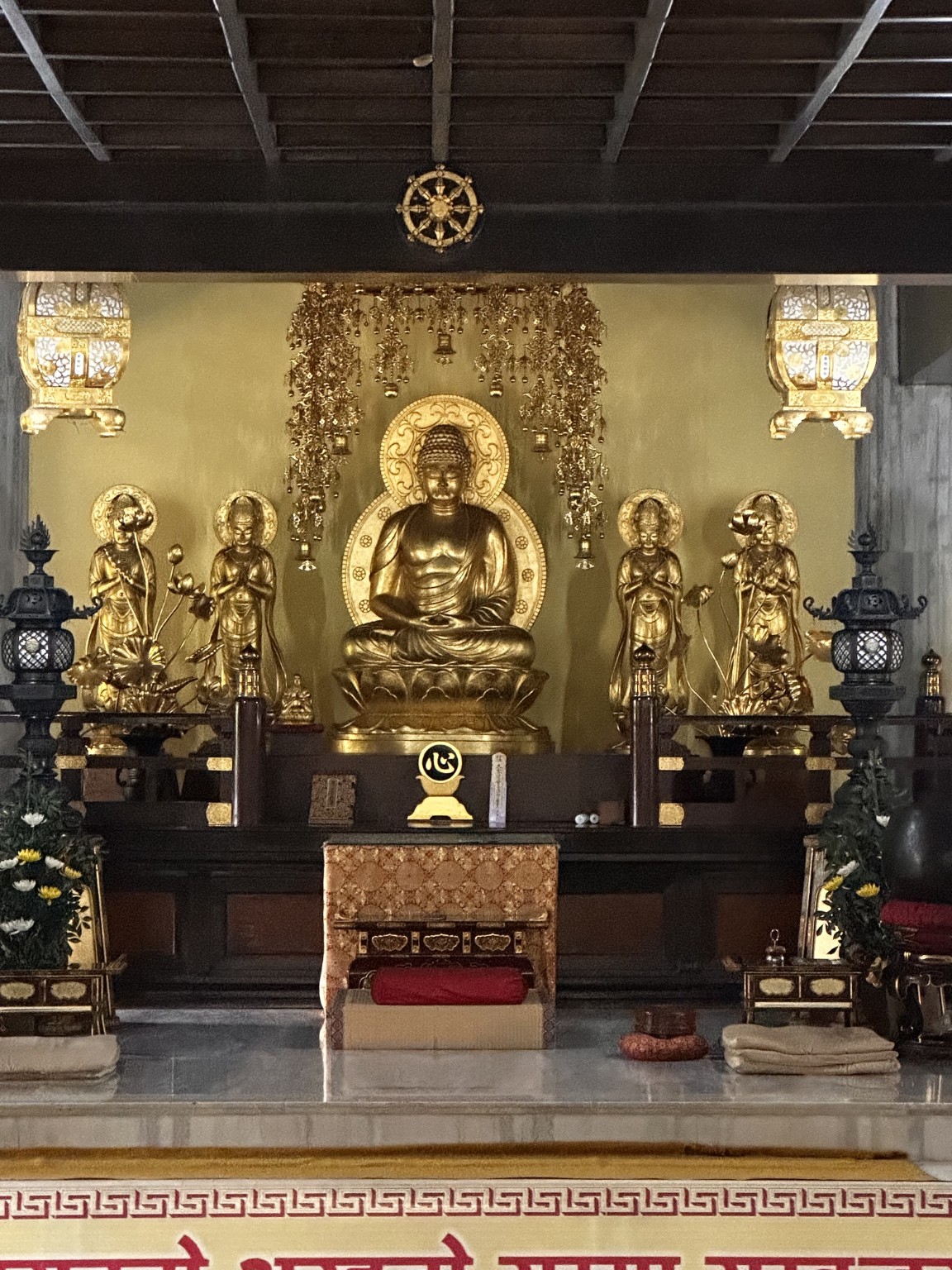 Golden Buddha statues inside a temple