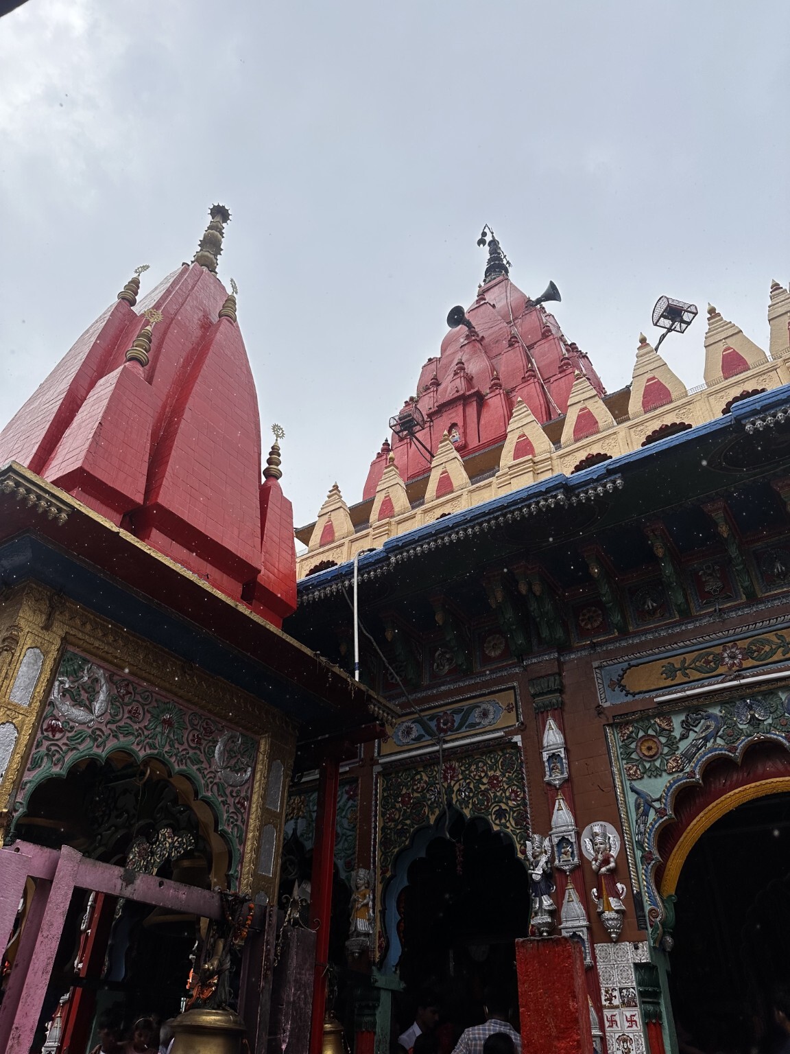 Colourful courtyard and temple towers at Hanuman Garhi