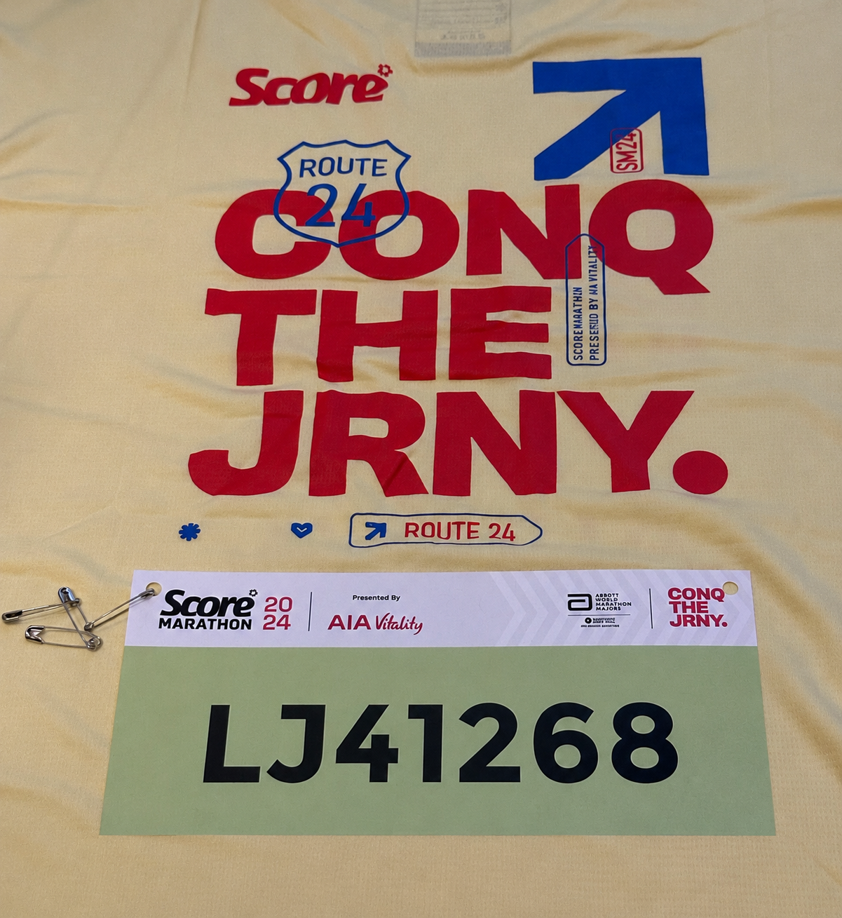 Race shirt and bib number LJ41268 for SCORE Marathon 2024, cropped to exclude personal contact details.